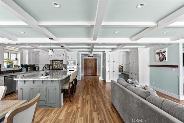 10270 Santa Ana Rd, Atascadero, CA 93422 - kitchen with gray cabinetry, appliances with stainless steel finishes, open floor plan, wood finished floors, and coffered ceiling