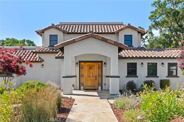 10270 Santa Ana Rd, Atascadero, CA 93422 - mediterranean / spanish house with a tiled roof and stucco siding