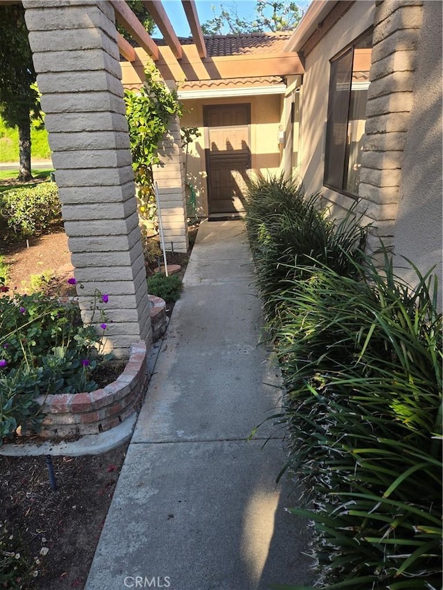 3137 Via Vis Unit A, Laguna Woods, CA 92637 - entrance to property featuring stucco siding and a tiled roof