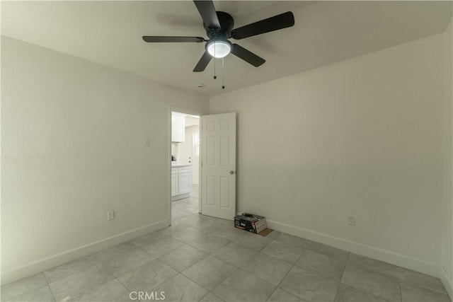 10010 Cedar Ave, Bloomington, CA 92316 - unfurnished room with baseboards and ceiling fan