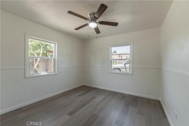 10010 Cedar Ave, Bloomington, CA 92316 - empty room featuring plenty of natural light, wood finished floors, a textured ceiling, and a ceiling fan