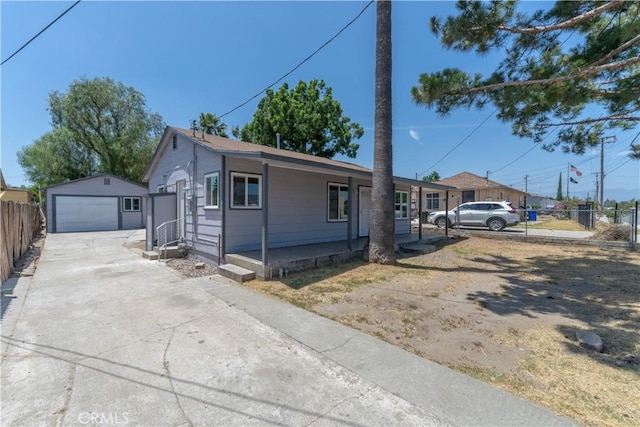 10010 Cedar Ave, Bloomington, CA 92316 - ranch-style house featuring an outdoor structure, a garage, concrete driveway, and a porch