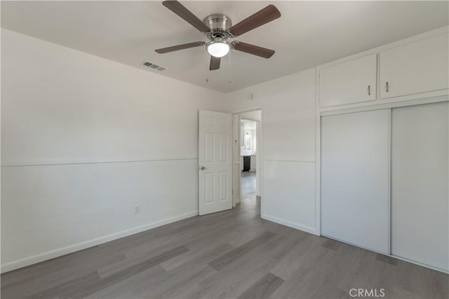 10010 Cedar Ave, Bloomington, CA 92316 - unfurnished bedroom featuring light wood-style floors, a closet, and a ceiling fan