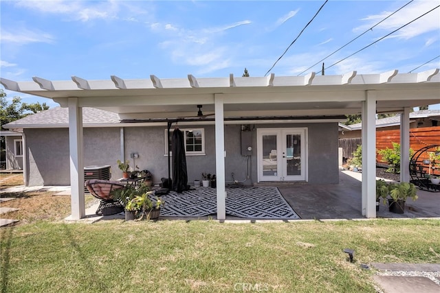 10480 Bryan St, Riverside, CA 92505 - back of house featuring french doors, stucco siding, and a patio