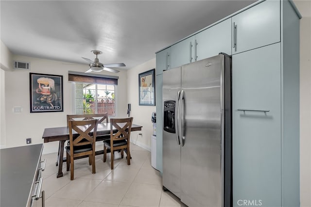10480 Bryan St, Riverside, CA 92505 - kitchen with stainless steel refrigerator with ice dispenser, ceiling fan, and light tile patterned floors