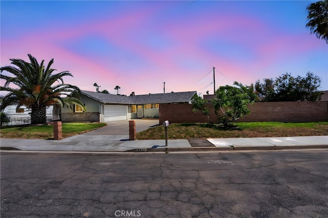 10480 Bryan St, Riverside, CA 92505 - ranch-style home with a garage and concrete driveway