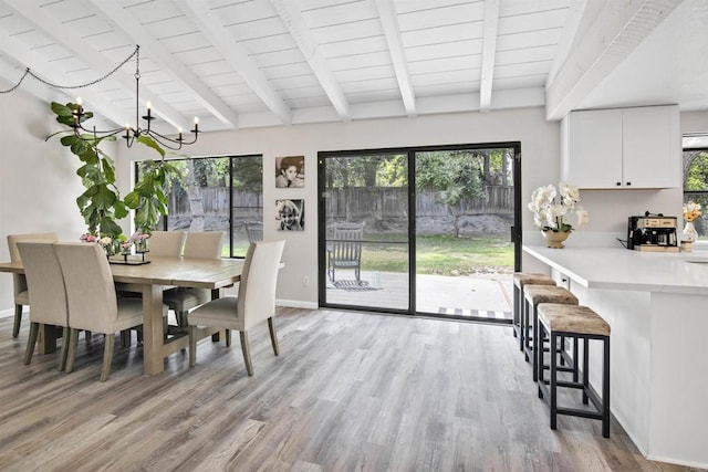 834 Cole Ranch Rd, Encinitas, CA 92024 - dining area featuring light wood-style flooring, plenty of natural light, wood ceiling, and a chandelier