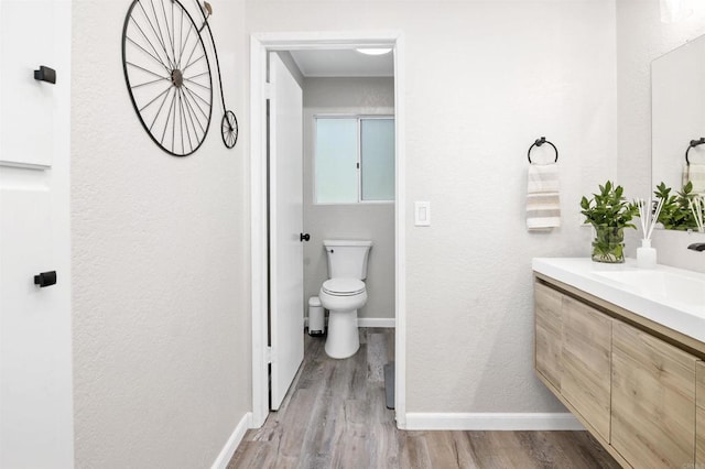 834 Cole Ranch Rd, Encinitas, CA 92024 - bathroom with vanity, wood finished floors, and a textured wall