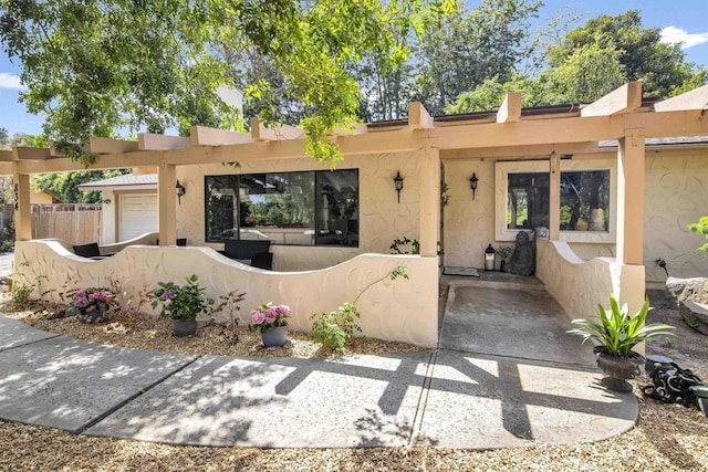 834 Cole Ranch Rd, Encinitas, CA 92024 - pueblo revival-style home with a fenced front yard and stucco siding