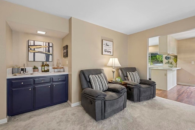 3551 Starboard Cir, Oceanside, CA 92054 - living area featuring bar with sink and light colored carpet