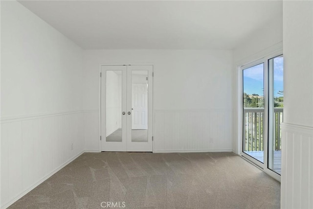 4440 Eagle Peak Rd Unit A, Concord, CA 94521 - carpeted spare room featuring french doors and wainscoting