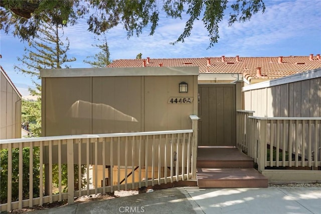 4440 Eagle Peak Rd Unit A, Concord, CA 94521 - view of exterior entry featuring a tiled roof