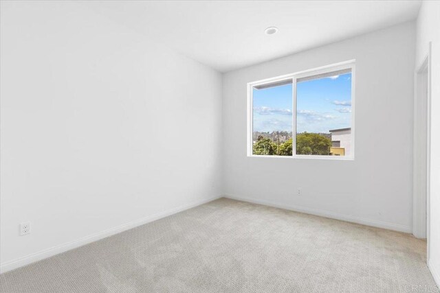 320 El Cajon Blvd, El Cajon, CA 92020 - unfurnished room featuring light carpet