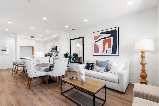 320 El Cajon Blvd, El Cajon, CA 92020 - living area with light wood-style flooring and recessed lighting