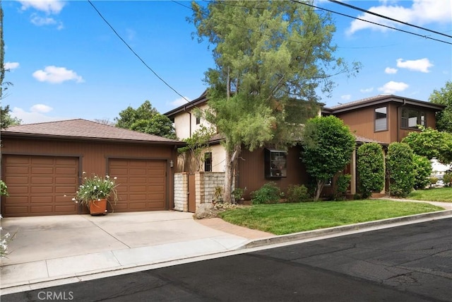 3654 4th Ave, La Crescenta, CA 91214 - view of front of home featuring concrete driveway, an attached garage, and a front yard