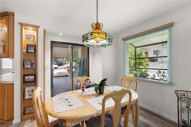 3654 4th Ave, La Crescenta, CA 91214 - dining space with baseboards and wood finished floors