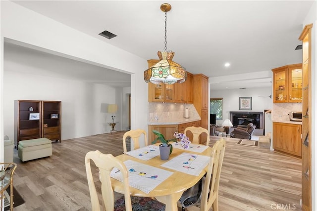 3654 4th Ave, La Crescenta, CA 91214 - dining space featuring light wood-style flooring and recessed lighting