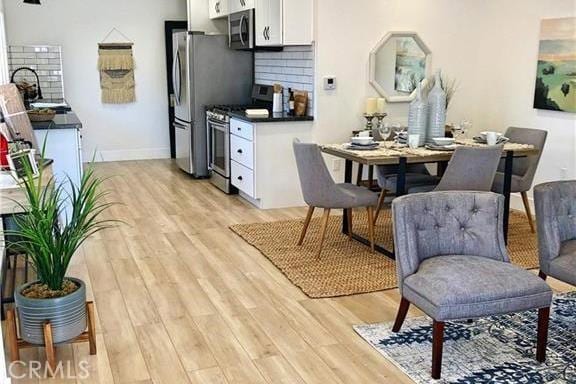 341 W Whiting Ave W, Fullerton, CA 92832 - dining room featuring light wood finished floors