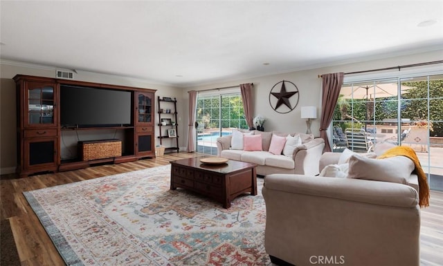 18921 Silver Maple Way N, Tustin, CA 92705 - living area featuring light wood-style floors and ornamental molding