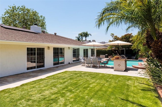 18921 Silver Maple Way N, Tustin, CA 92705 - back of house featuring stucco siding, a yard, a patio area, and an outdoor pool