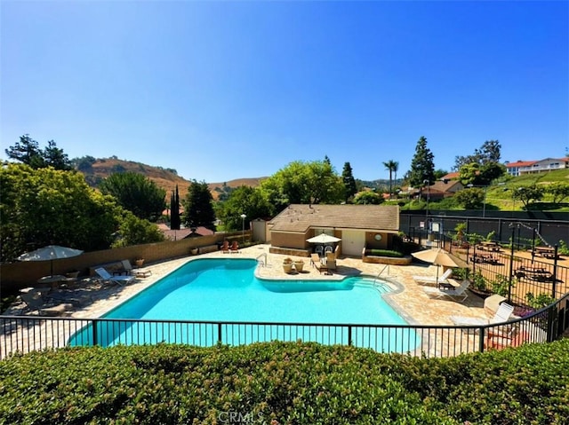 15429 Turquoise Cir N, Chino Hills, CA 91709 - community pool featuring a patio and a mountain view