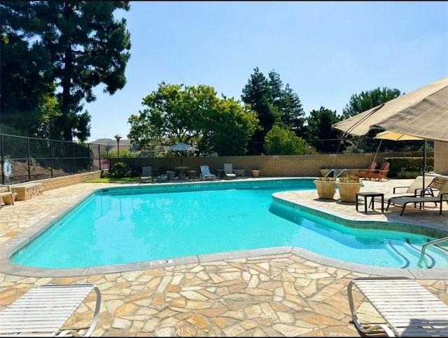 15429 Turquoise Cir N, Chino Hills, CA 91709 - community pool with a patio area and a fenced backyard