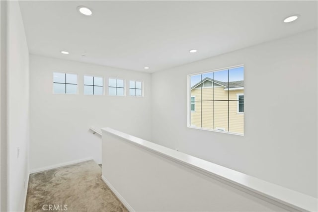 421 Azalea St, Fillmore, CA 93015 - hallway with light carpet, recessed lighting, and an upstairs landing
