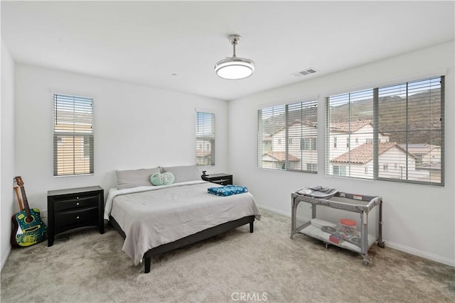 421 Azalea St, Fillmore, CA 93015 - bedroom with multiple windows and carpet flooring