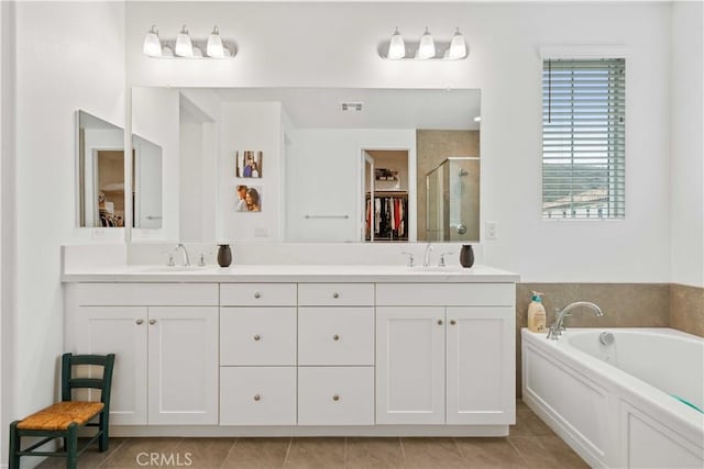 421 Azalea St, Fillmore, CA 93015 - full bathroom featuring a stall shower, double vanity, tile patterned floors, and a bath