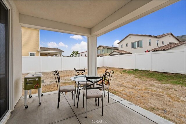 421 Azalea St, Fillmore, CA 93015 - fenced backyard featuring a patio area and outdoor dining area