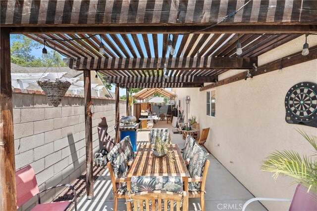 11116 Wayfield Rd, Riverside, CA 92505 - fenced backyard featuring outdoor dining area, a patio area, and a pergola