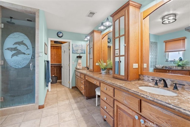 11116 Wayfield Rd, Riverside, CA 92505 - full bathroom featuring a shower stall, double vanity, and tile patterned floors