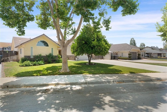 11116 Wayfield Rd, Riverside, CA 92505 - ranch-style house featuring an attached garage, driveway, stucco siding, and a residential view