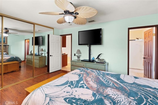 11116 Wayfield Rd, Riverside, CA 92505 - bedroom with a closet, wood finished floors, ceiling fan, and ensuite bathroom