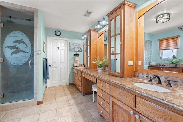 11116 Wayfield Rd, Riverside, CA 92505 - full bathroom featuring a stall shower, double vanity, and tile patterned flooring