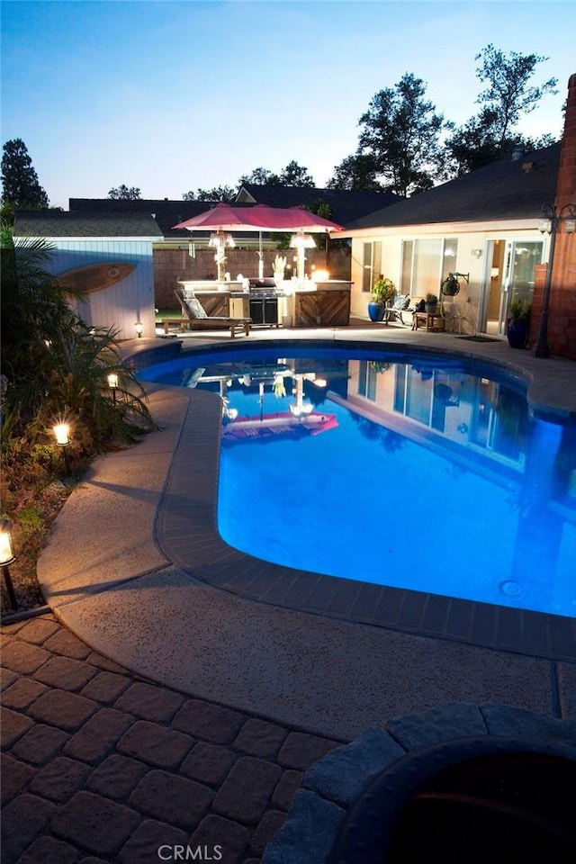 11116 Wayfield Rd, Riverside, CA 92505 - view of swimming pool featuring a patio area and an outbuilding