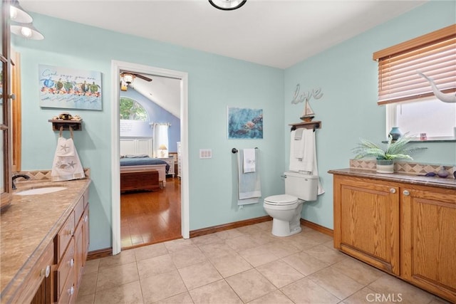 11116 Wayfield Rd, Riverside, CA 92505 - full bath with vanity, ensuite bath, a ceiling fan, and tile patterned floors