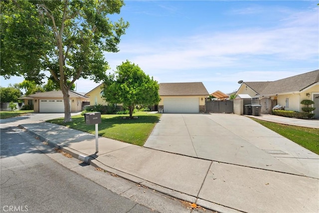 11116 Wayfield Rd, Riverside, CA 92505 - view of front facade featuring a garage, driveway, a gate, and a residential view