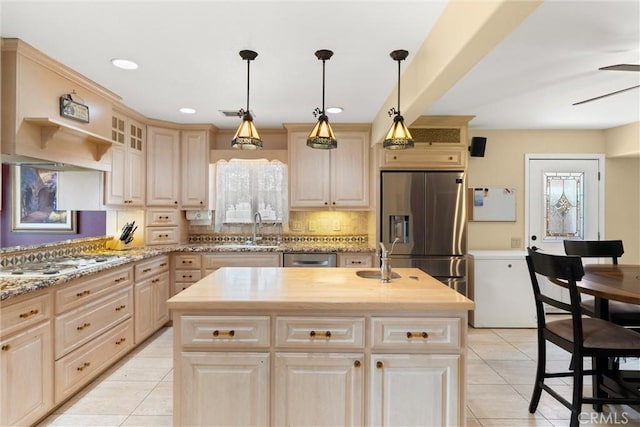 11116 Wayfield Rd, Riverside, CA 92505 - kitchen featuring stainless steel appliances, light tile patterned floors, healthy amount of natural light, pendant lighting, and recessed lighting