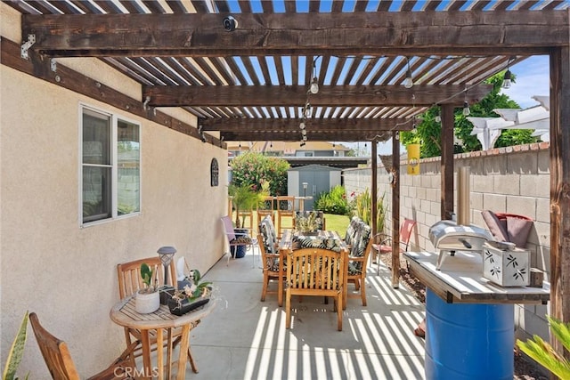11116 Wayfield Rd, Riverside, CA 92505 - fenced backyard with a shed, a pergola, outdoor dining space, and a patio area
