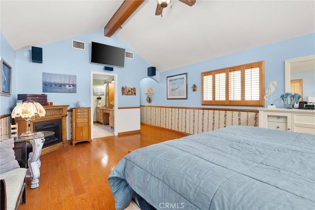 11116 Wayfield Rd, Riverside, CA 92505 - bedroom with beamed ceiling, wood finished floors, a wainscoted wall, ceiling fan, and high vaulted ceiling