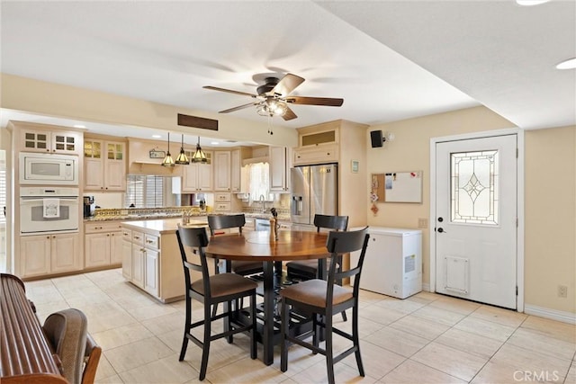 11116 Wayfield Rd, Riverside, CA 92505 - dining room featuring a ceiling fan and light tile patterned flooring