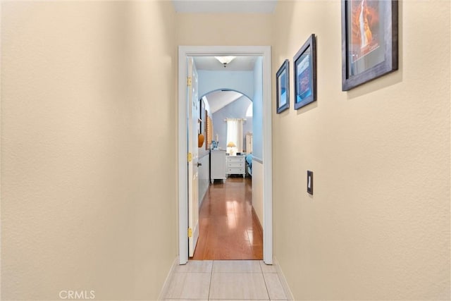 11116 Wayfield Rd, Riverside, CA 92505 - hallway featuring arched walkways and light tile patterned floors