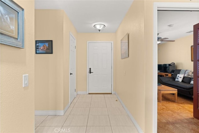 11116 Wayfield Rd, Riverside, CA 92505 - hallway featuring baseboards and light tile patterned flooring