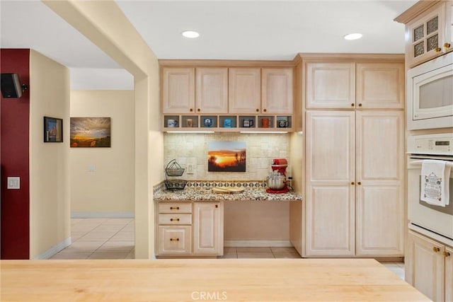 11116 Wayfield Rd, Riverside, CA 92505 - kitchen featuring white appliances, light tile patterned floors, light brown cabinetry, backsplash, and light stone countertops