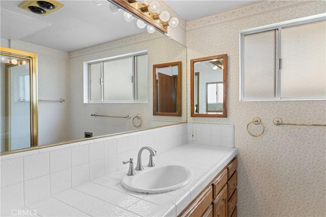 10868 Willowcrest Pl, Studio City, CA 91604 - bathroom featuring wallpapered walls, plenty of natural light, and vanity