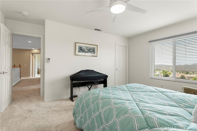 25 Vista Palermo, Lake Elsinore, CA 92532 - bedroom with light carpet and ceiling fan