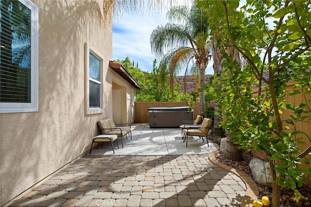 25 Vista Palermo, Lake Elsinore, CA 92532 - fenced backyard featuring a hot tub and a patio