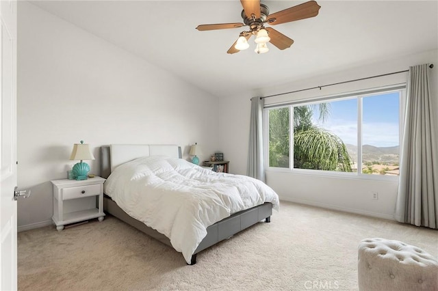 25 Vista Palermo, Lake Elsinore, CA 92532 - bedroom featuring vaulted ceiling, light colored carpet, and ceiling fan