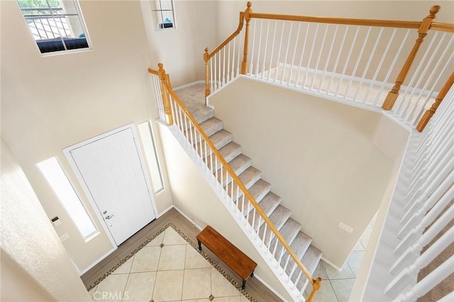 25 Vista Palermo, Lake Elsinore, CA 92532 - stairway featuring tile patterned floors and healthy amount of natural light